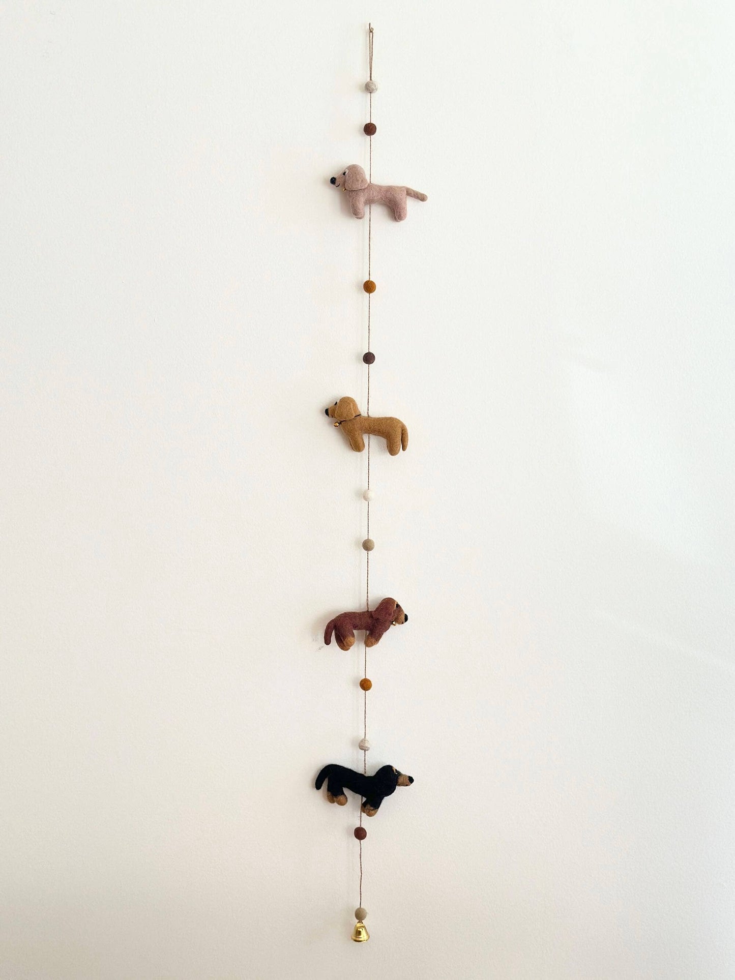 Felted hanging garland with four dachshund dogs