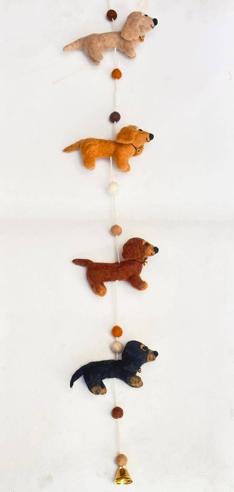 Felted hanging garland with four dachshund dogs