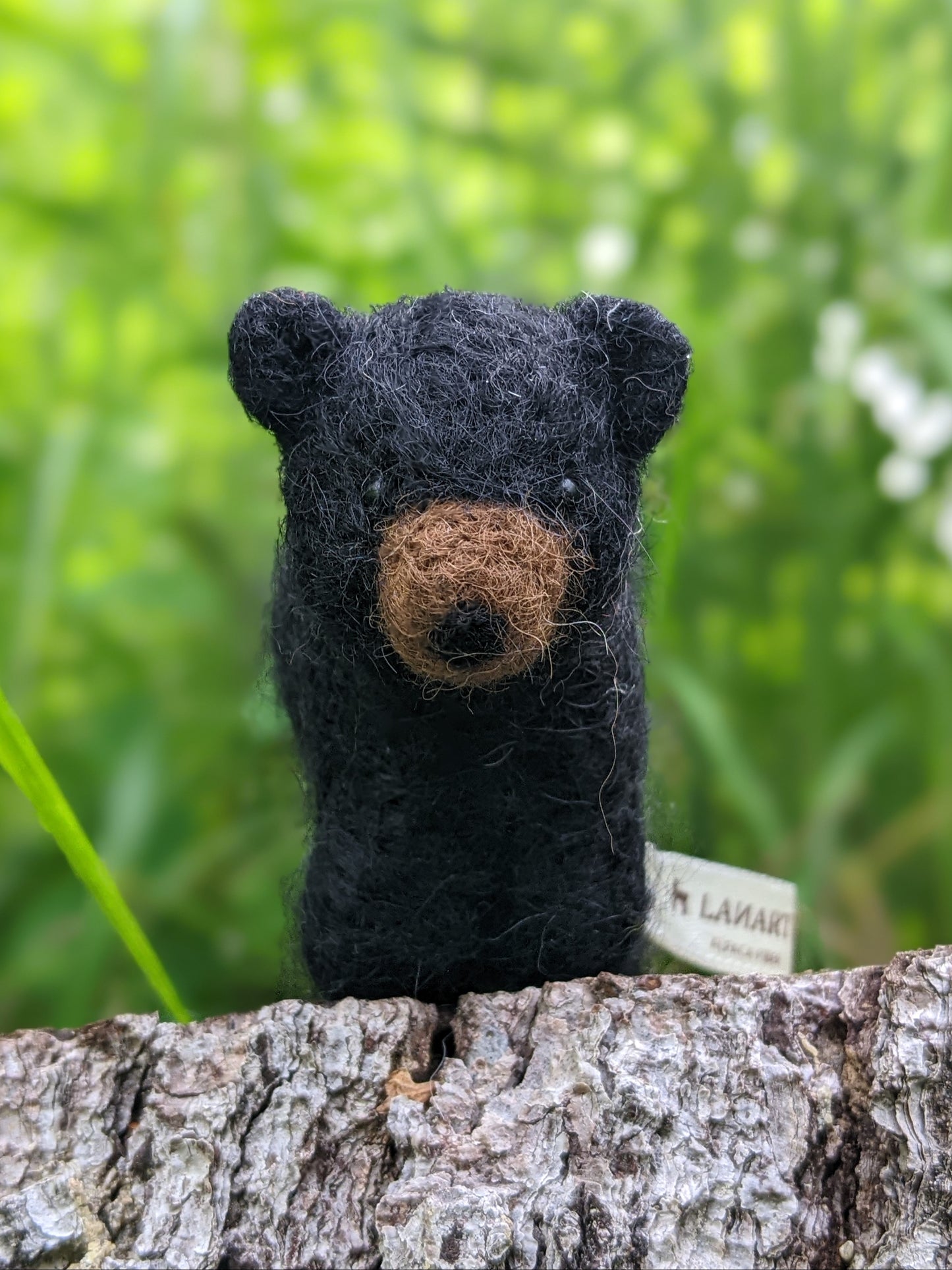needle felted wool black bear cub sculpture close up