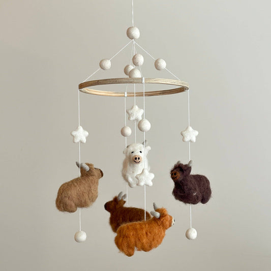 baby mobile with 5 needle felted wool highland cows in different colors