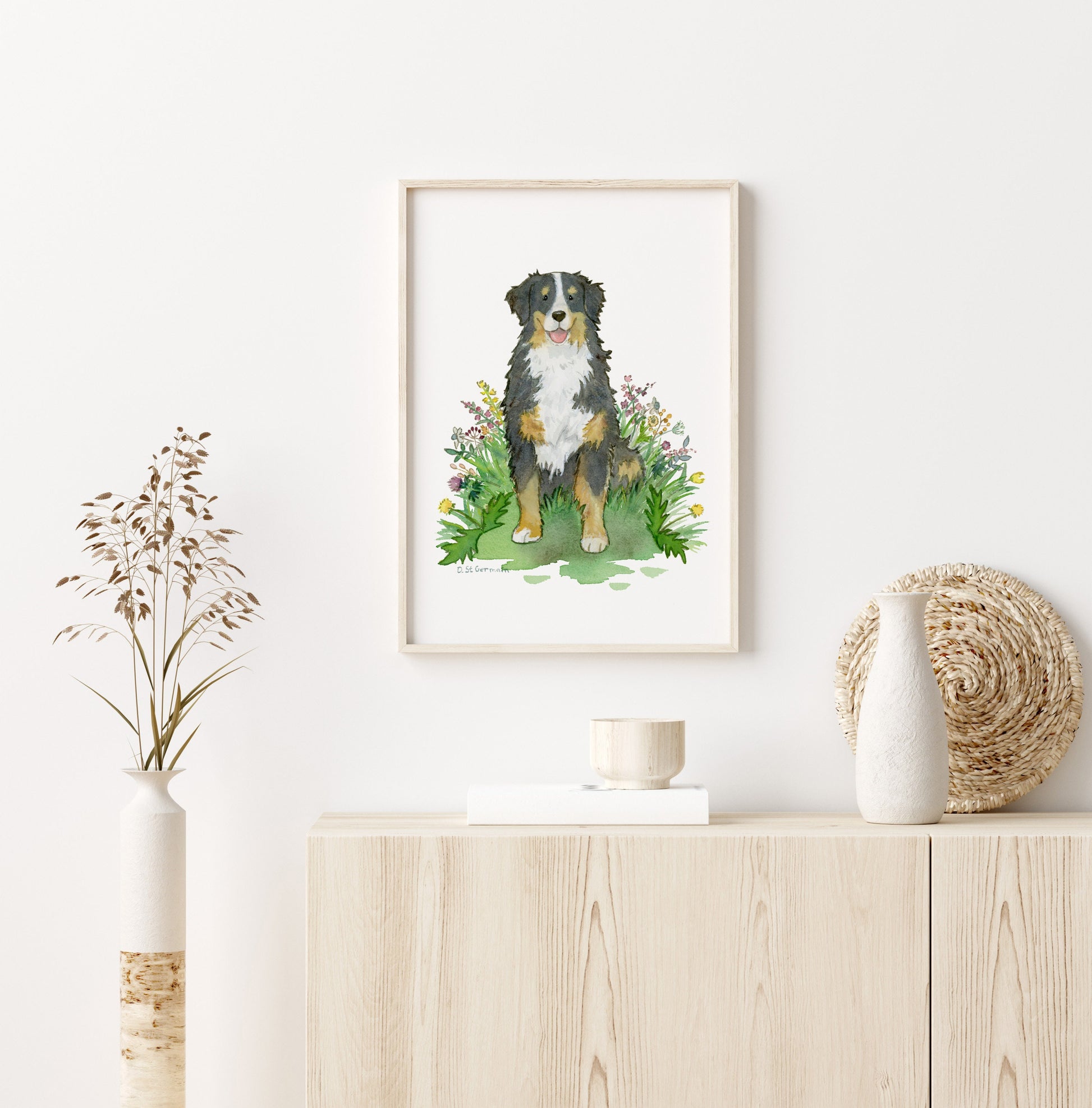 Framed watercolor print of happy Bernese Mountain dog sitting in colorful flowers.