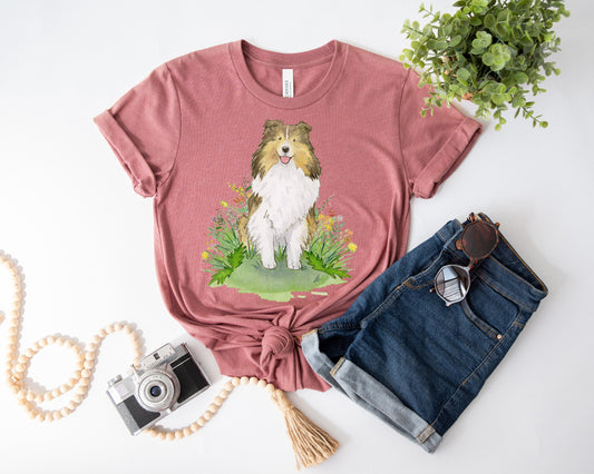 Kids tee shirt with sable sheltie dog and flowers on it.