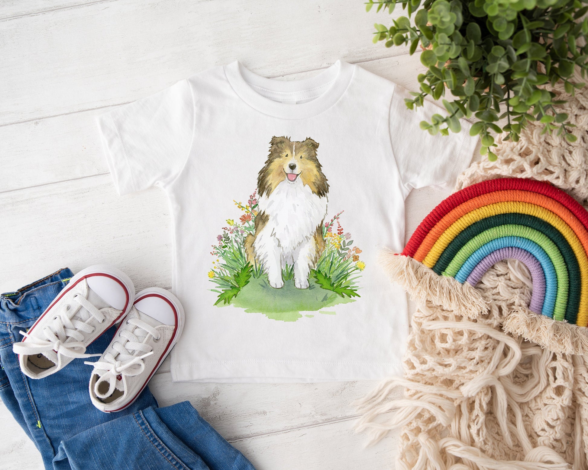 Kids tee shirt with sable sheltie dog and flowers on it.