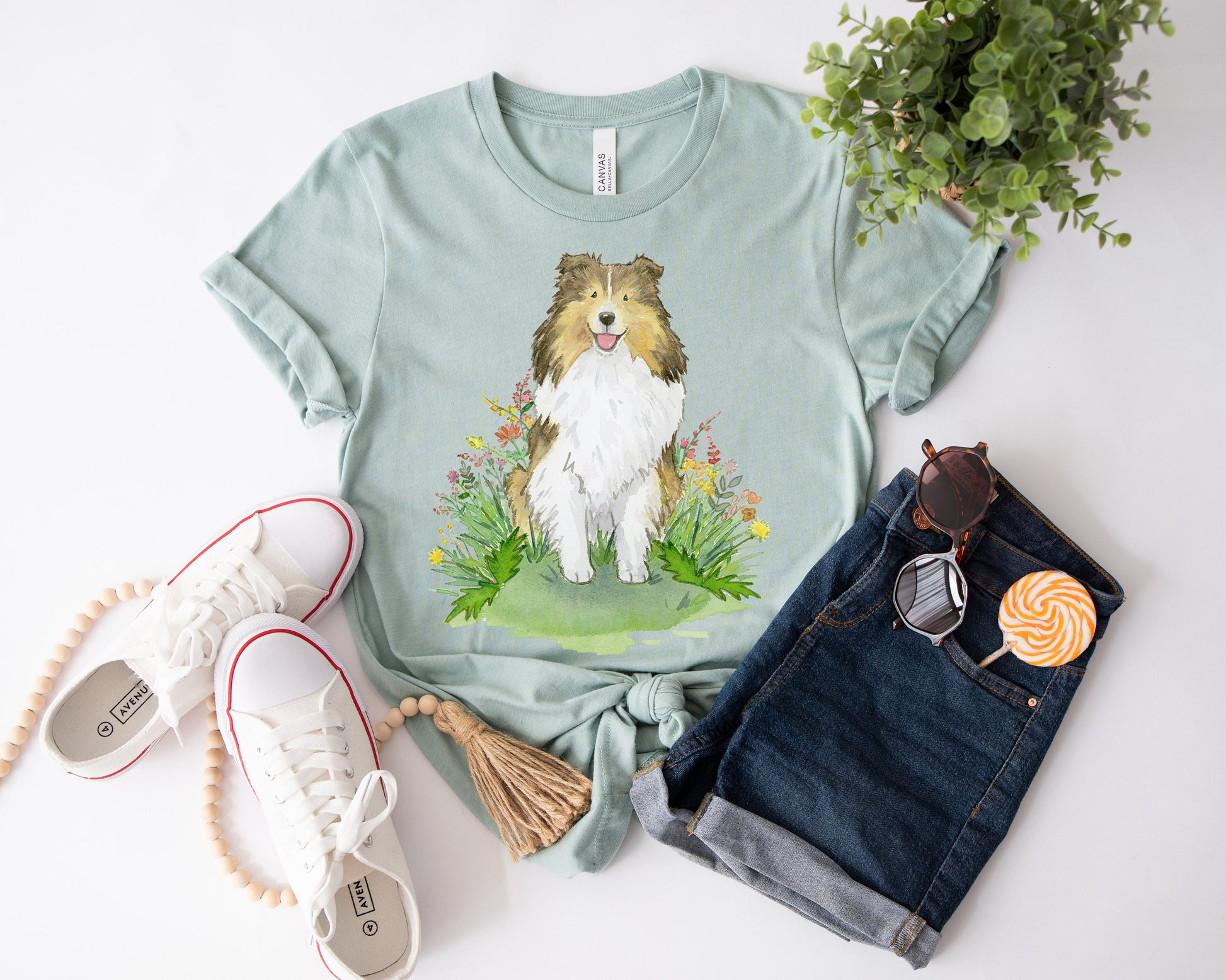 Kids tee shirt with sable sheltie dog and flowers on it.