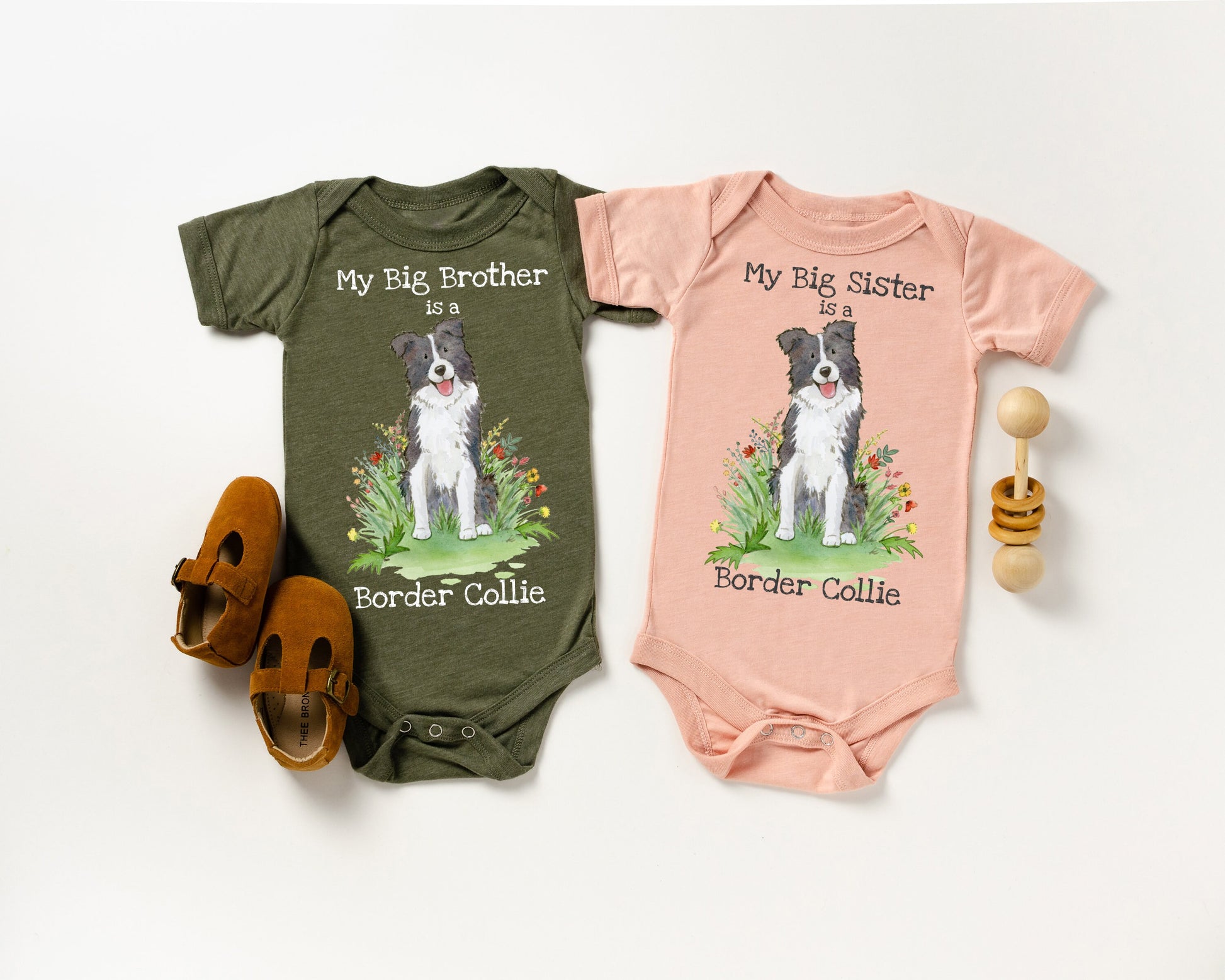 Baby bodysuits with a black and white border collie picture and "My big brother is a border collie" and "my big sister is a border collie" printed on them.