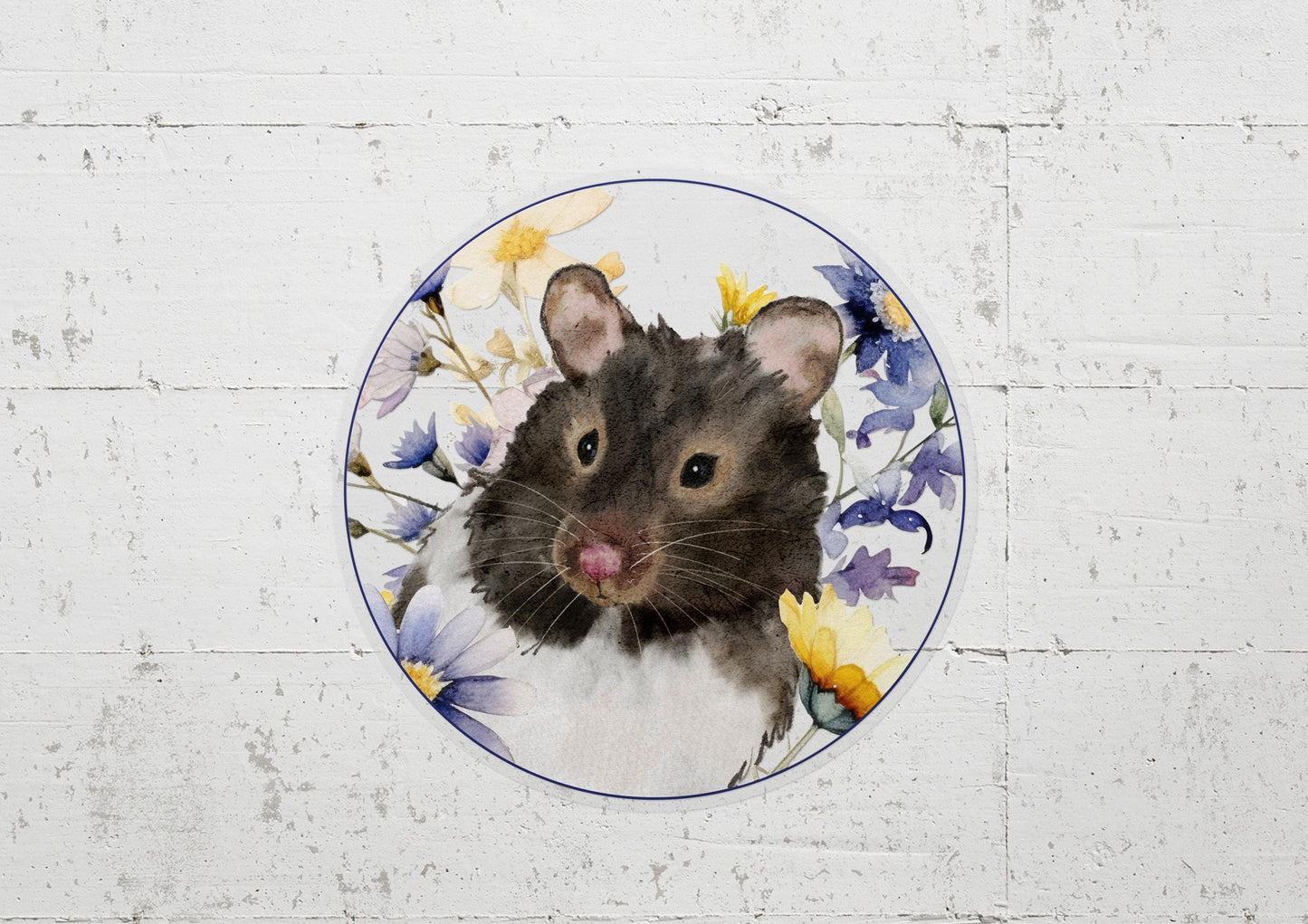 circle sticker with a black and white hamster and flowers on it