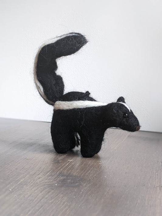 black and white needle felted wool skunk ornament