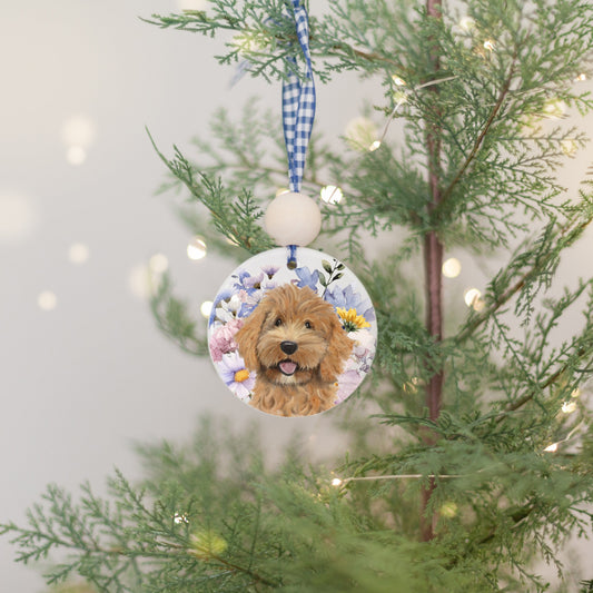 ceramic ornament with red and white doodle puppy and blue and purple wildflowers