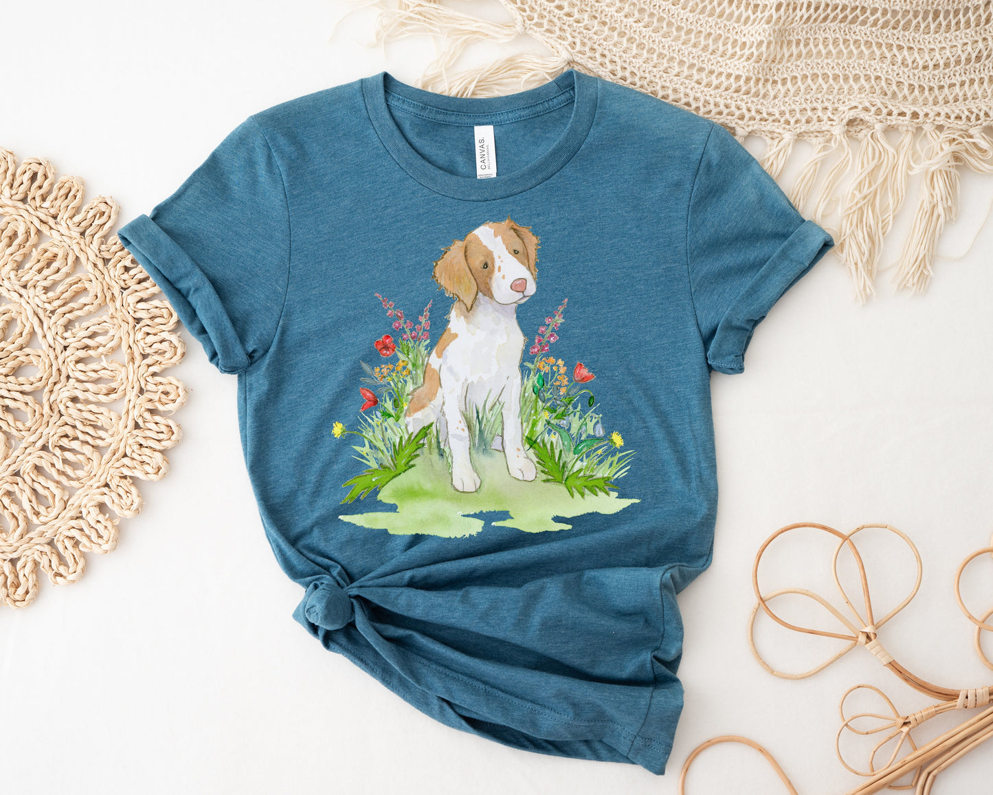Deep teal Brittany spaniel with flowers tee.