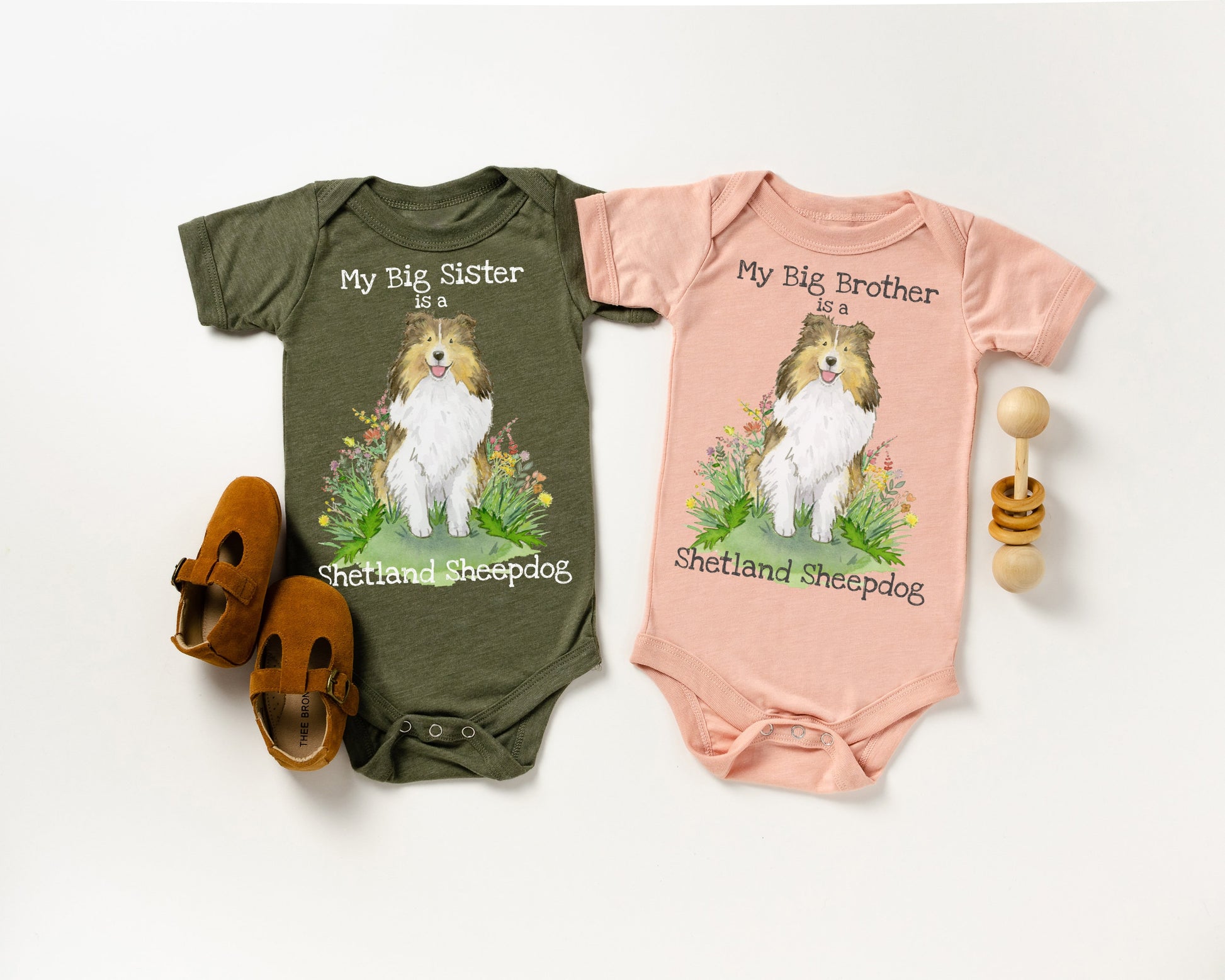Baby bodysuit with cute sable sheltie puppy on it