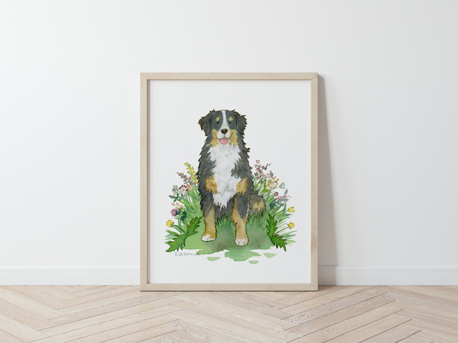 Framed watercolor print of happy Bernese Mountain dog sitting in colorful flowers.