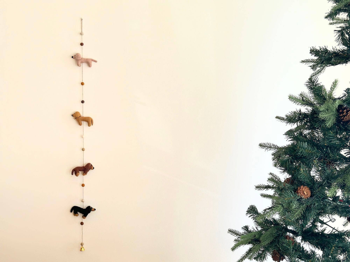 Felted hanging garland with four dachshund dogs