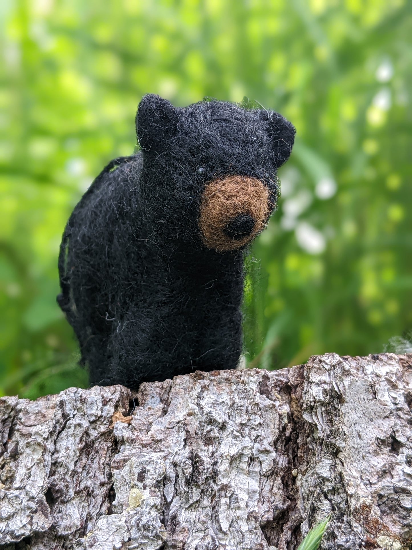 needle felted wool black bear cub sculpture close up