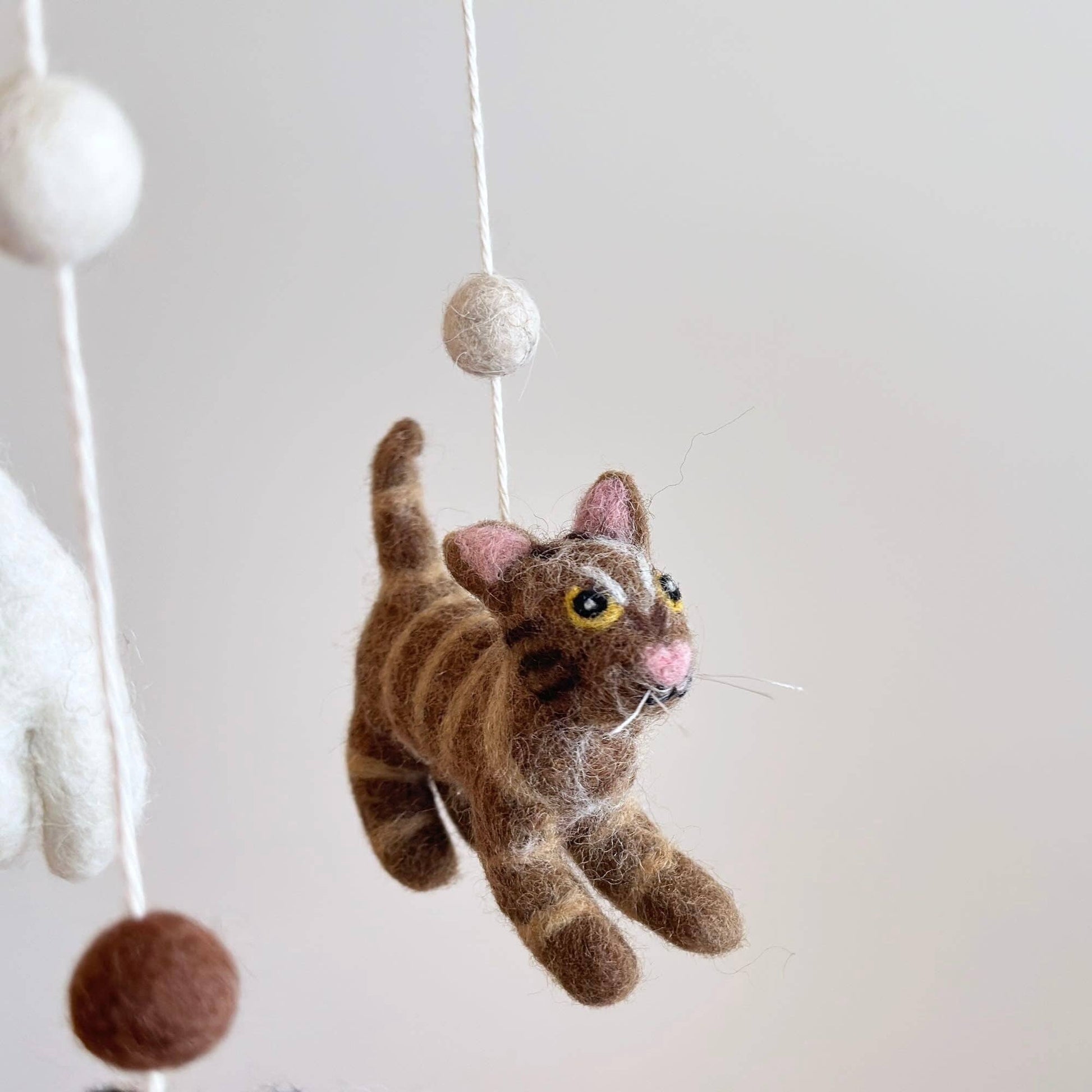 brown tabby baby mobile