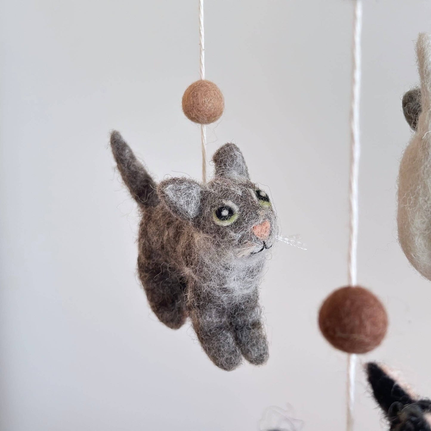 needle felted grey tabby cat on baby mobile