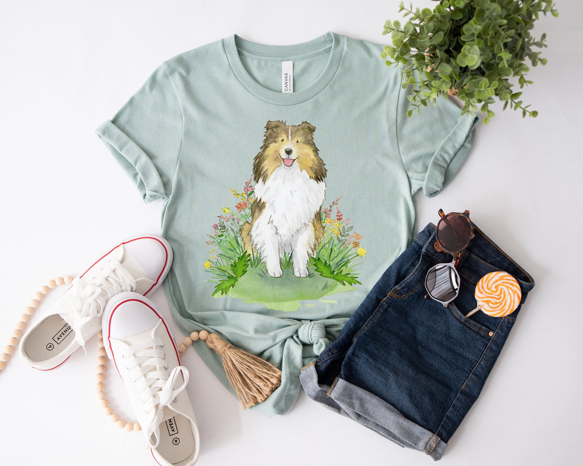 Kids tee shirt with sable sheltie dog and flowers on it.