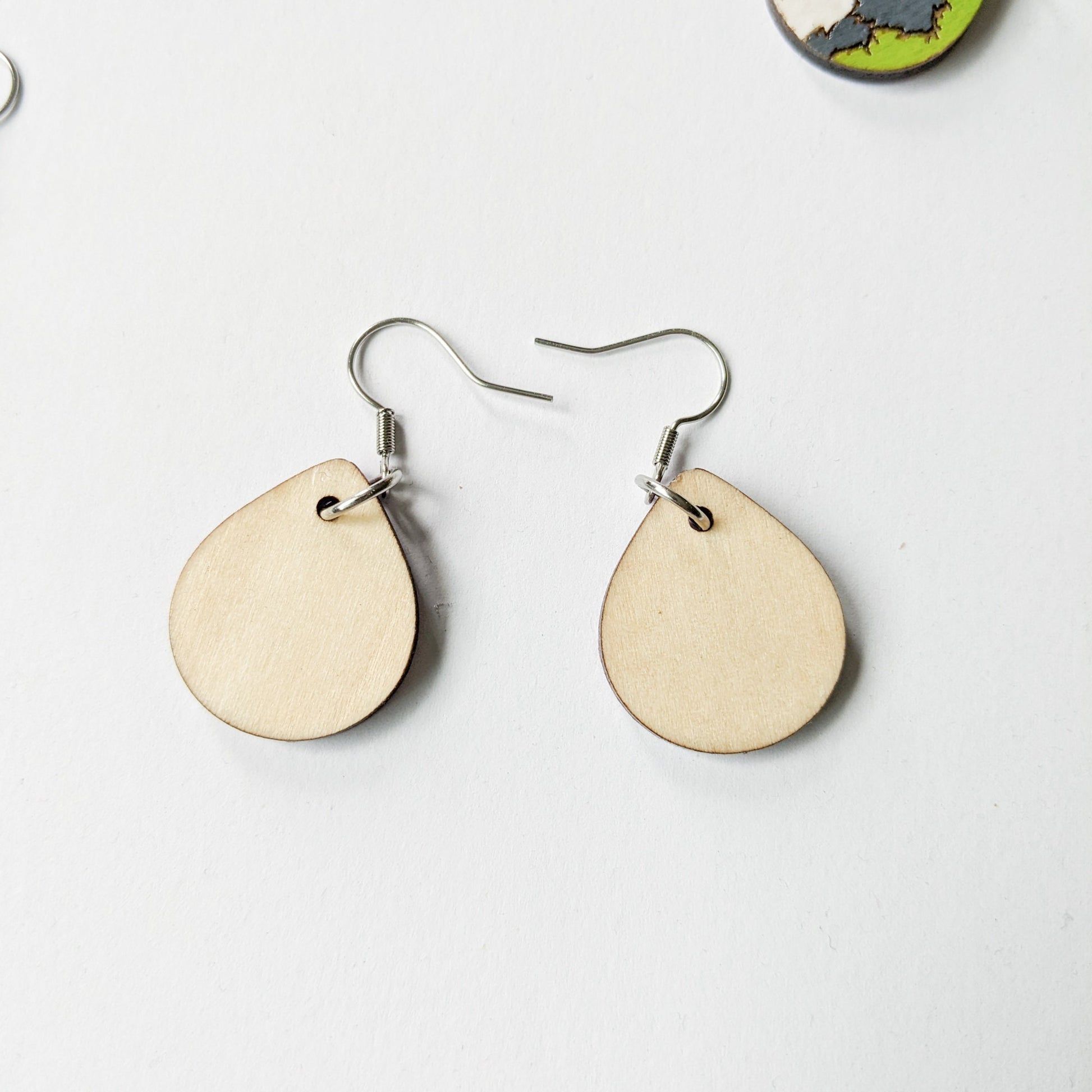 Back side of birch plywood earrings.