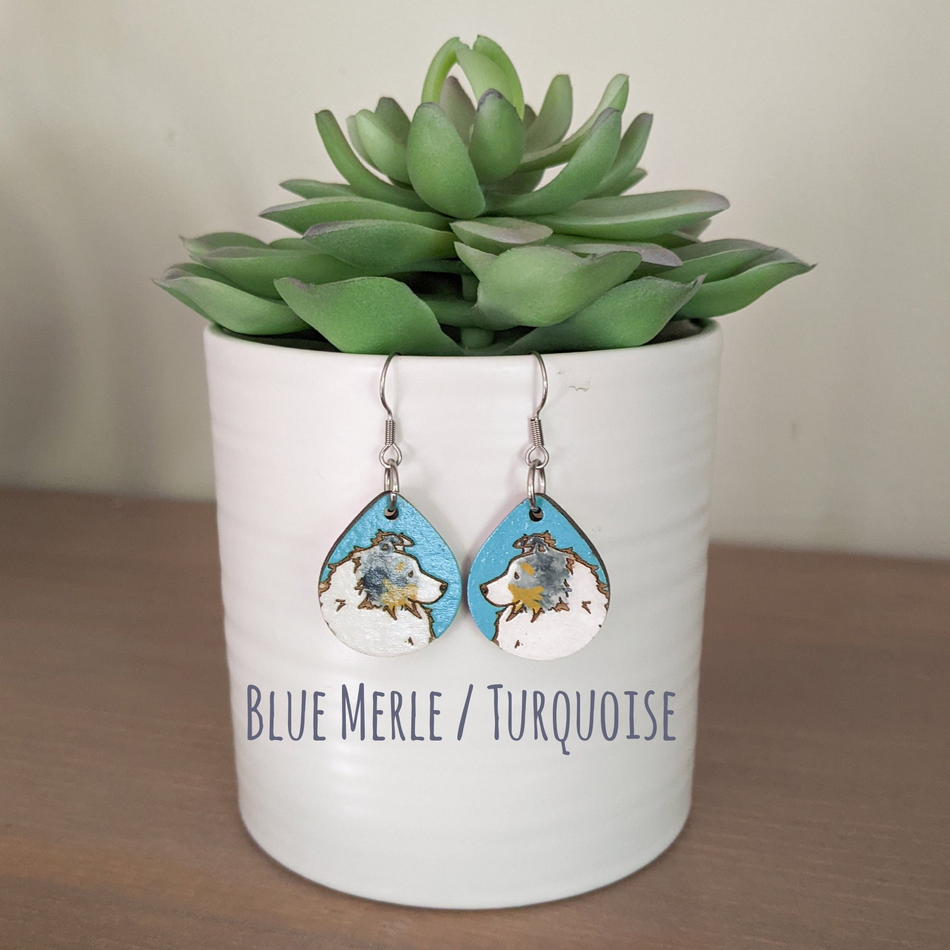 Blue Merle hand painted, laser engraved sheltie earrings.