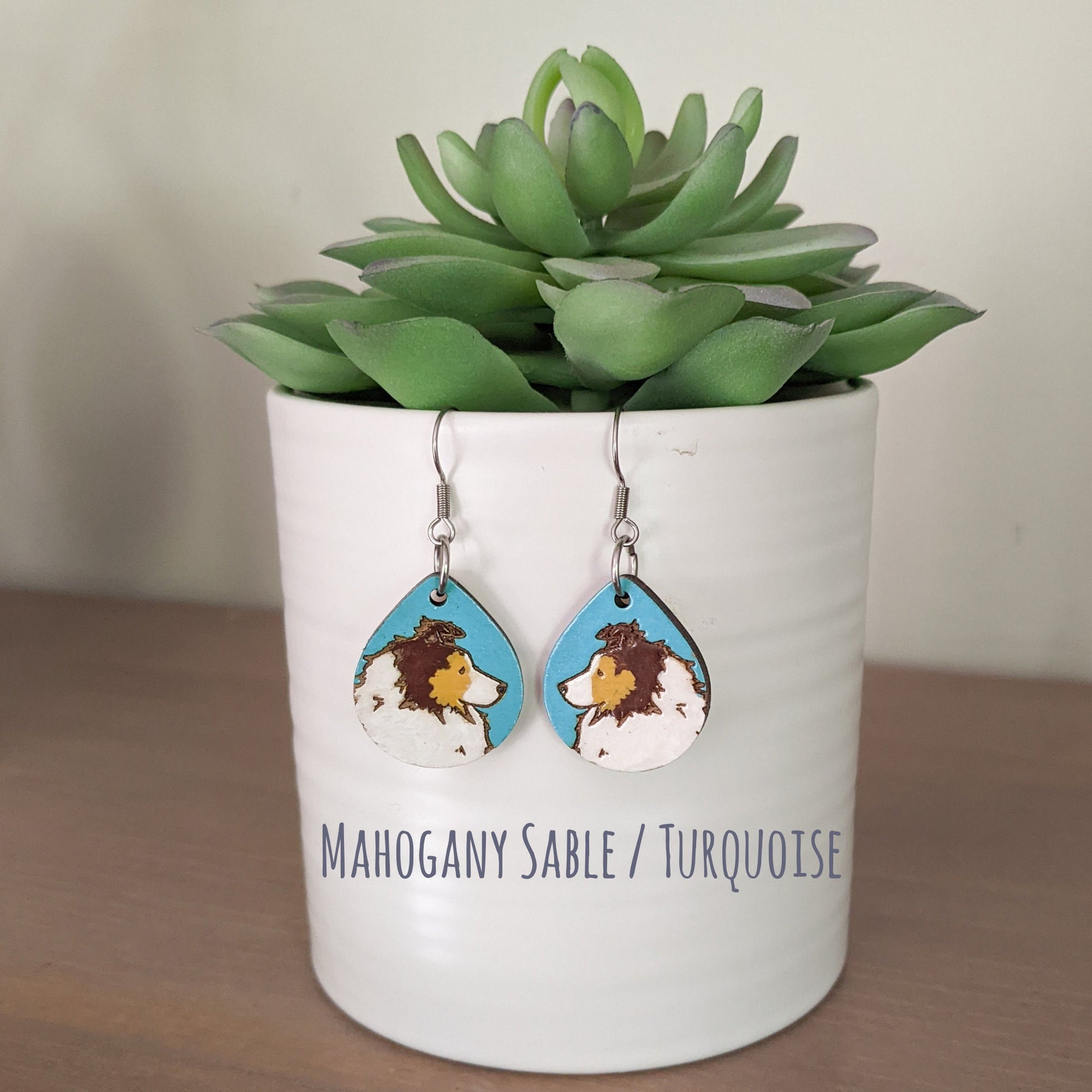 Mahagony Sable hand painted, laser engraved sheltie earrings.