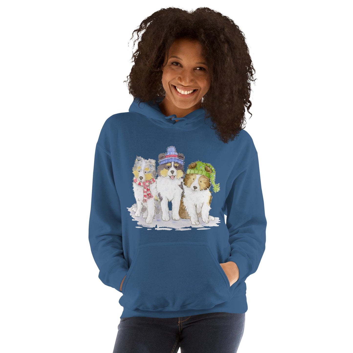 Hooded sweatshirt with three sheltie puppies wearing winter hats and scarves.