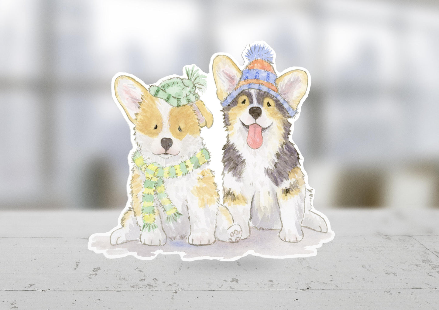 welsh corgi puppies wearing hats and scarves sticker