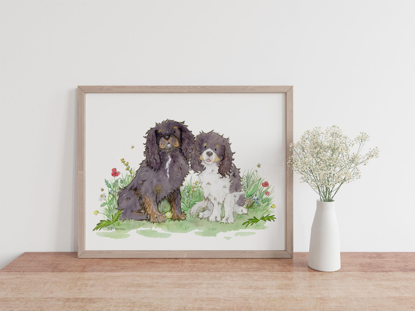 framed watercolor print of two cavalier King Charles spaniels and colorful flowers
