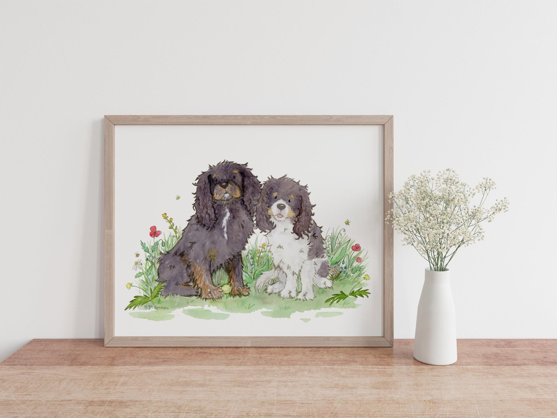 framed watercolor print of two cavalier King Charles spaniels and colorful flowers