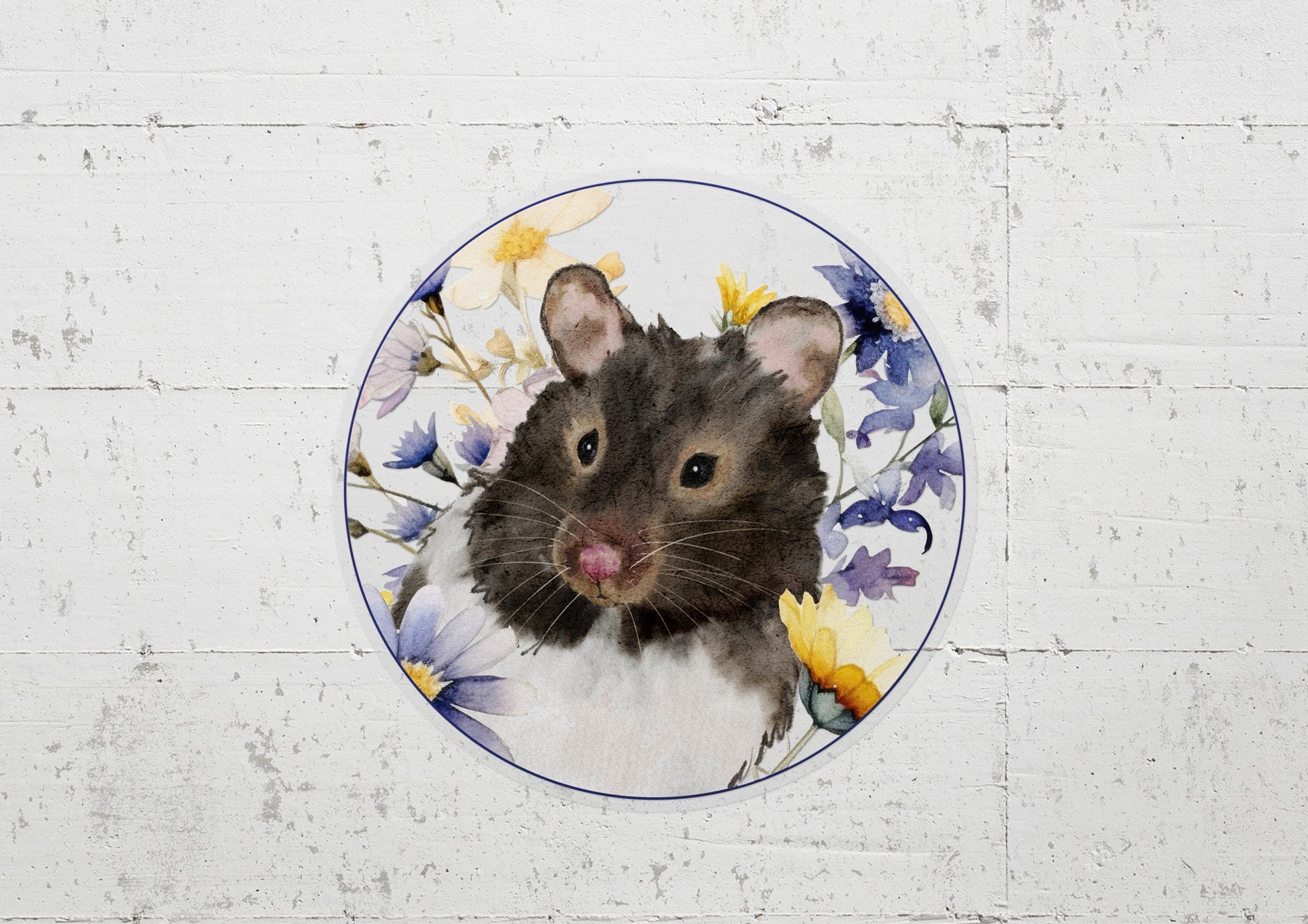 circle sticker with a black and white hamster and flowers on it