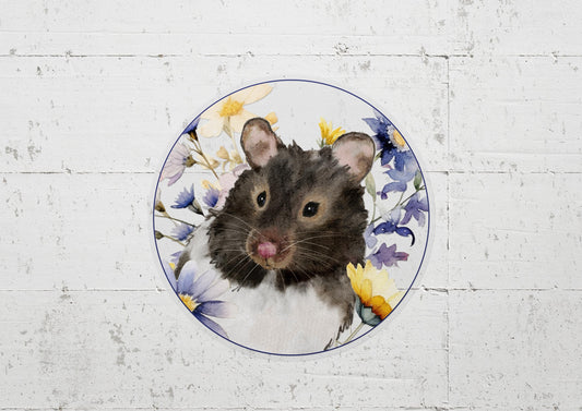 circle sticker with a black and white hamster and flowers on it