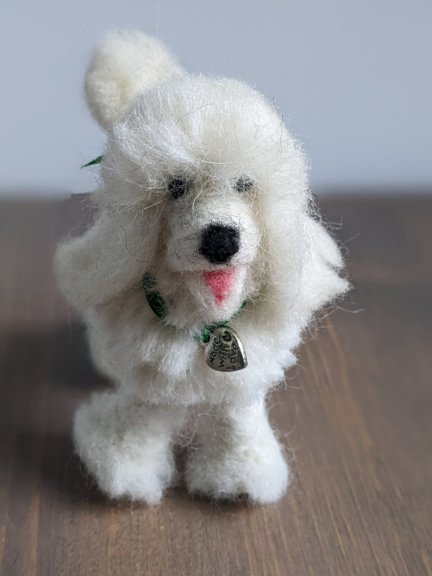 small white poodle handmade from needle felted wool close up