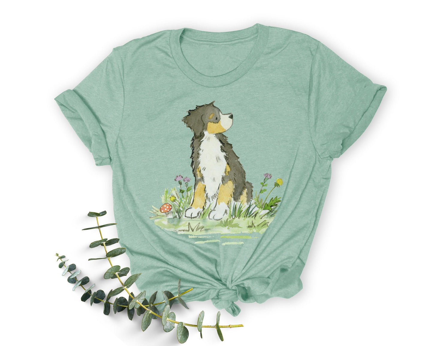 Blue green tee with cute Bernese mountain dog artwork on it.