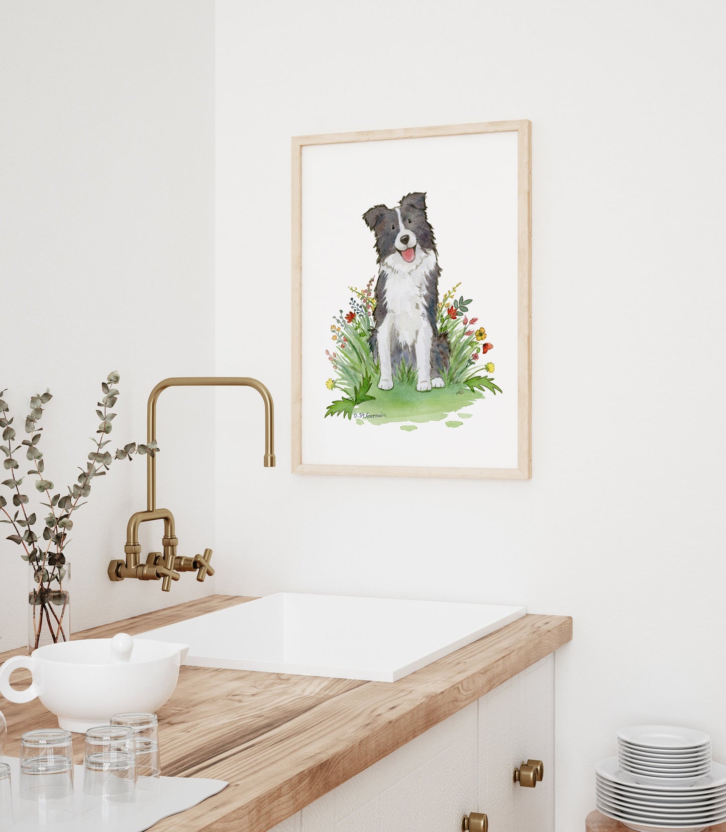 Framed print of a happy black and white border collie dog sitting in a patch of red and yellow wildflowers.