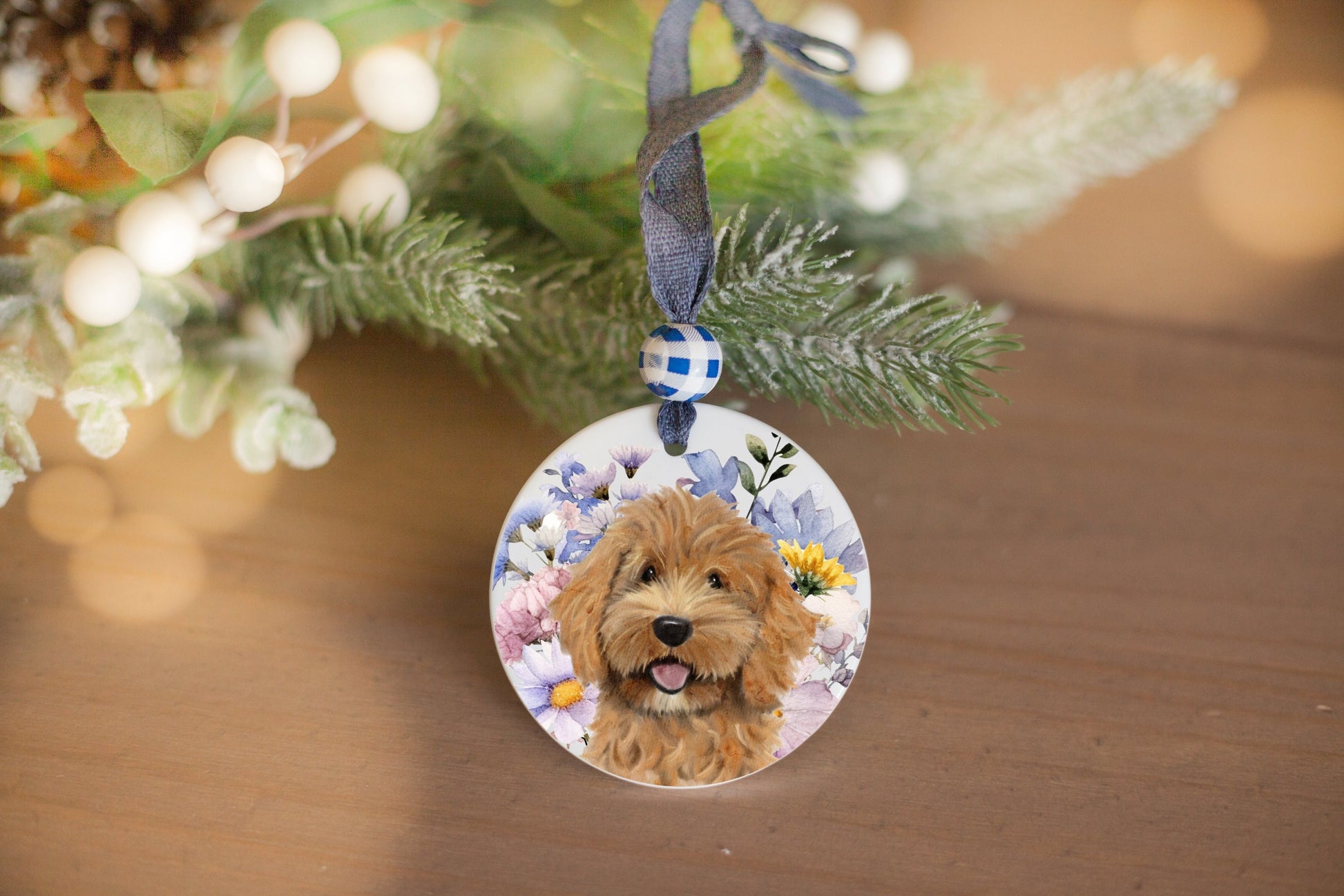 ceramic ornament with red and white doodle puppy and blue and purple wildflowers