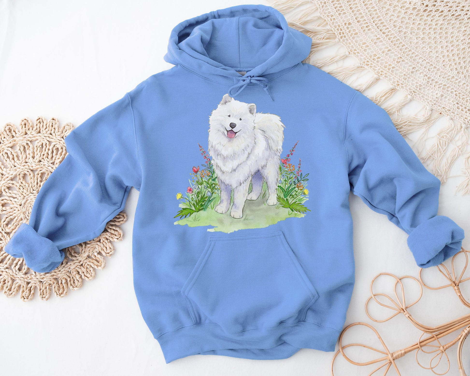 Blue hooded sweatshirt with cute artwork of samoyed dog and wildflowers