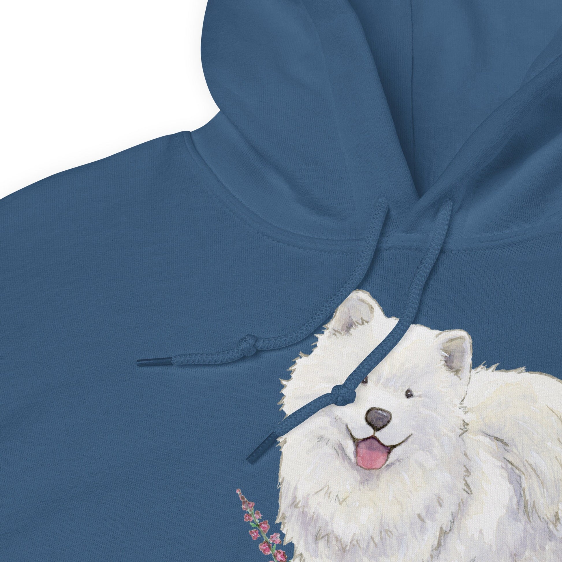 close up of dark blue hooded sweatshirt with cute artwork of samoyed dog and wildflowers