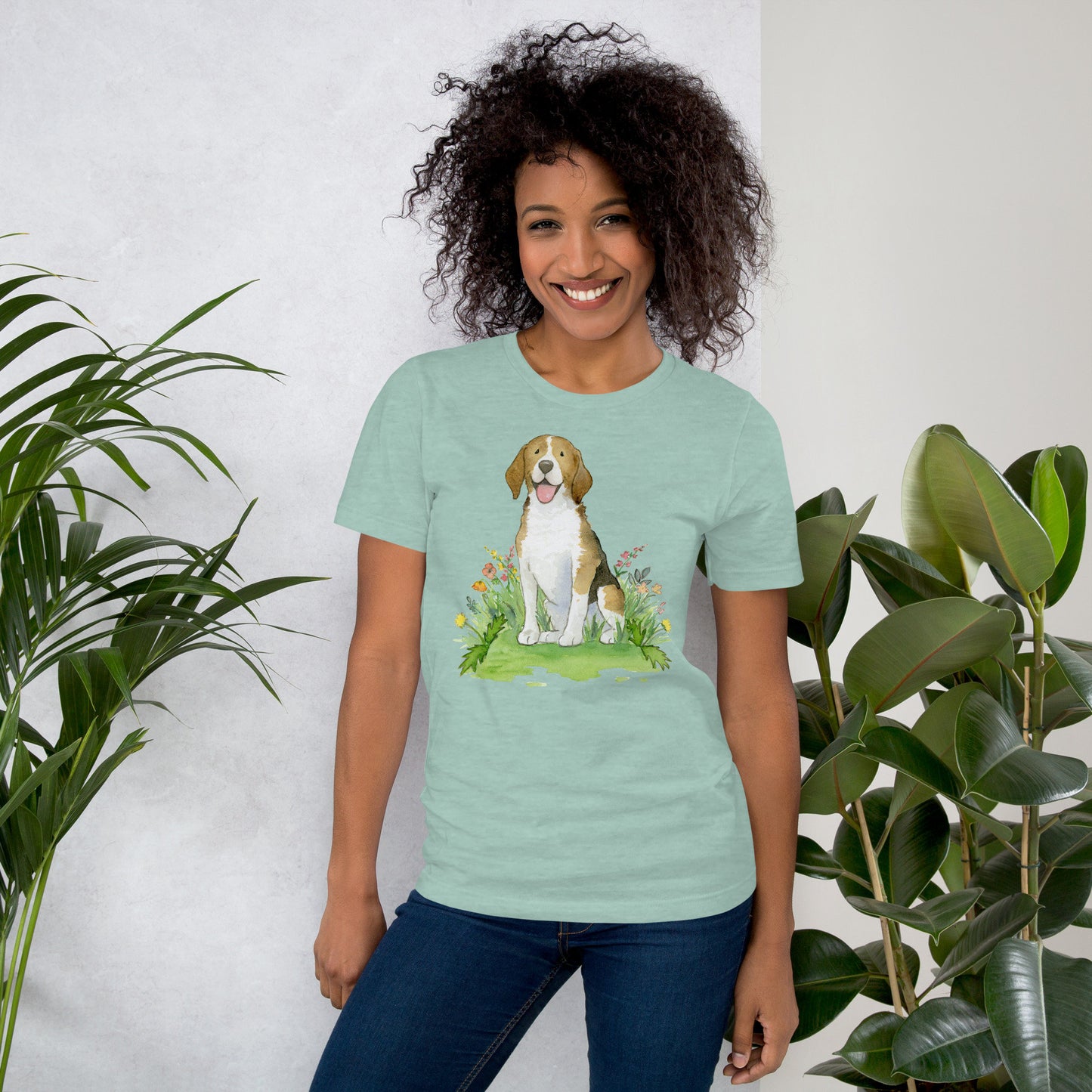 Light blue green colored t-shirt with cute beagle artwork on it worn by a model.