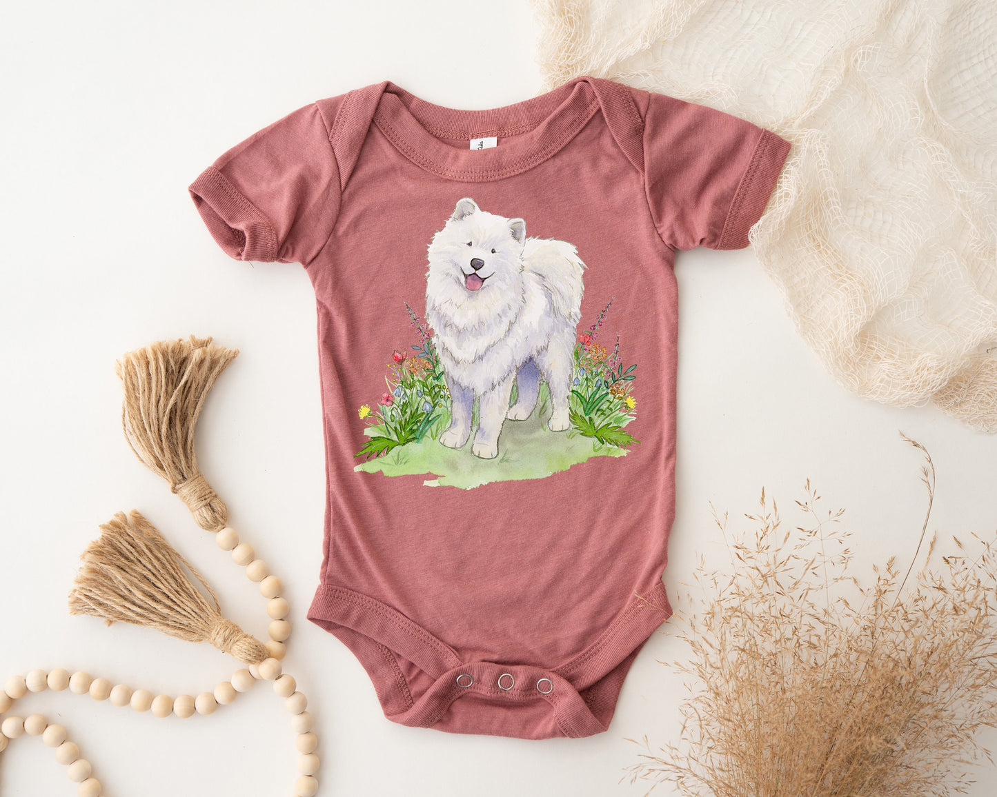 One-piece infant bodysuit with cute samoyed dog and flowers artwork.